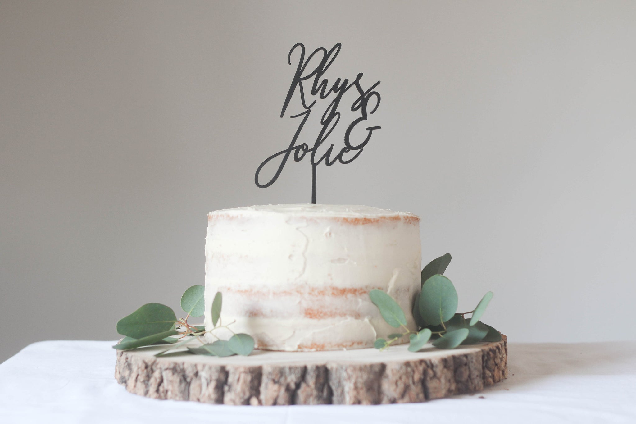 Contemporary Wedding Cake Topper With The Bride And Groom's First Name