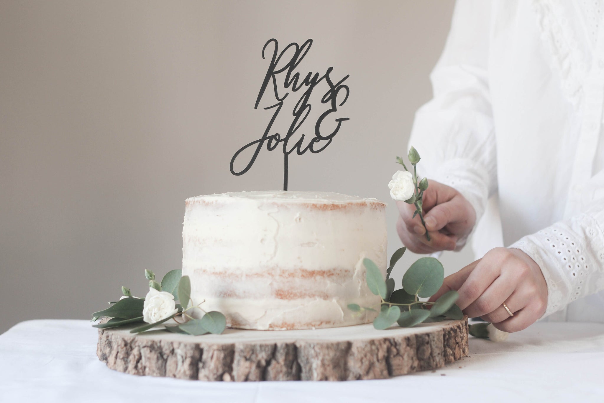 Contemporary Wedding Cake Topper With The Bride And Groom's First Name