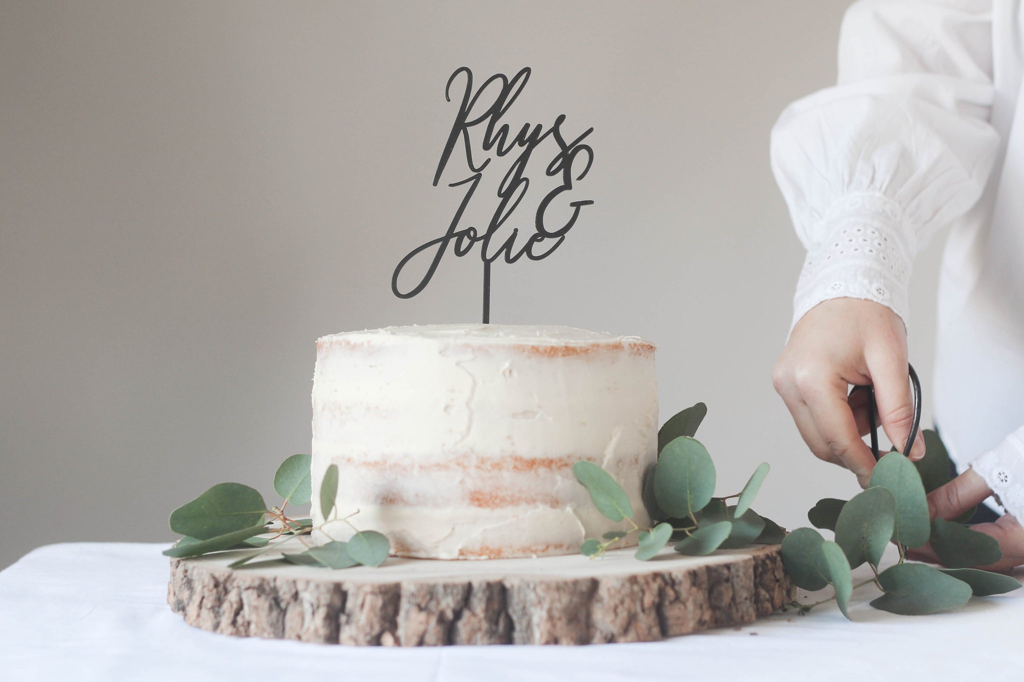 Contemporary Wedding Cake Topper With The Bride And Groom's First Name