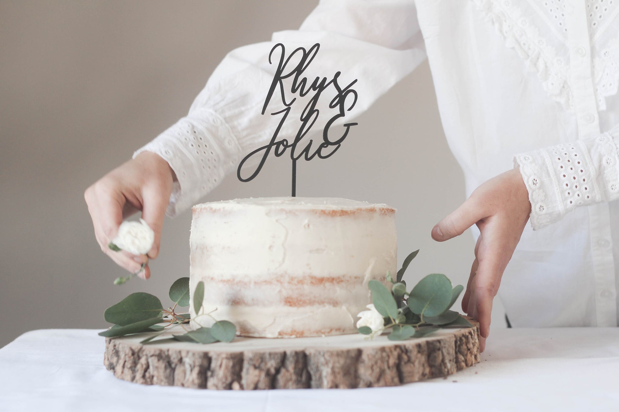 Contemporary Wedding Cake Topper With The Bride And Groom's First Name